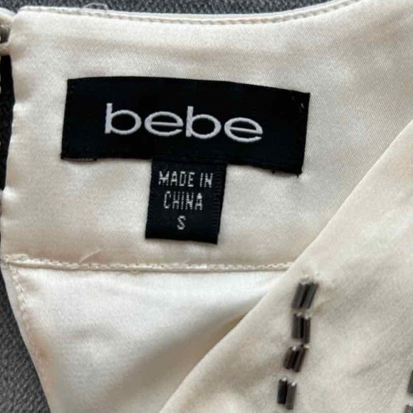 bebe Sleeveless Beaded Wrap Top - Picture 5 of 12